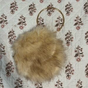 faux fur circular elegant hand purse